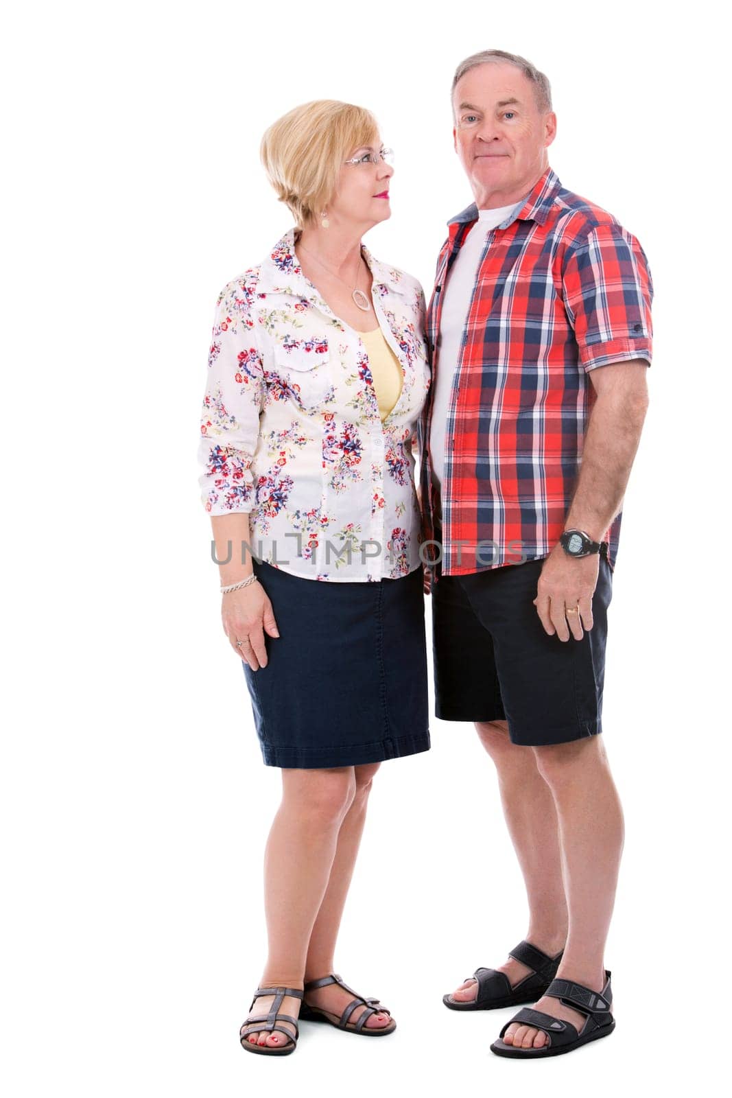 retired couple wearing casual outfits on white isolated background