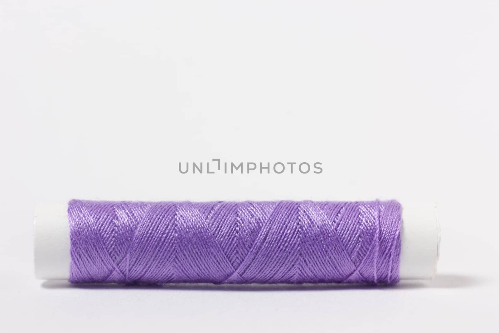 Cotton fabric purple on white background