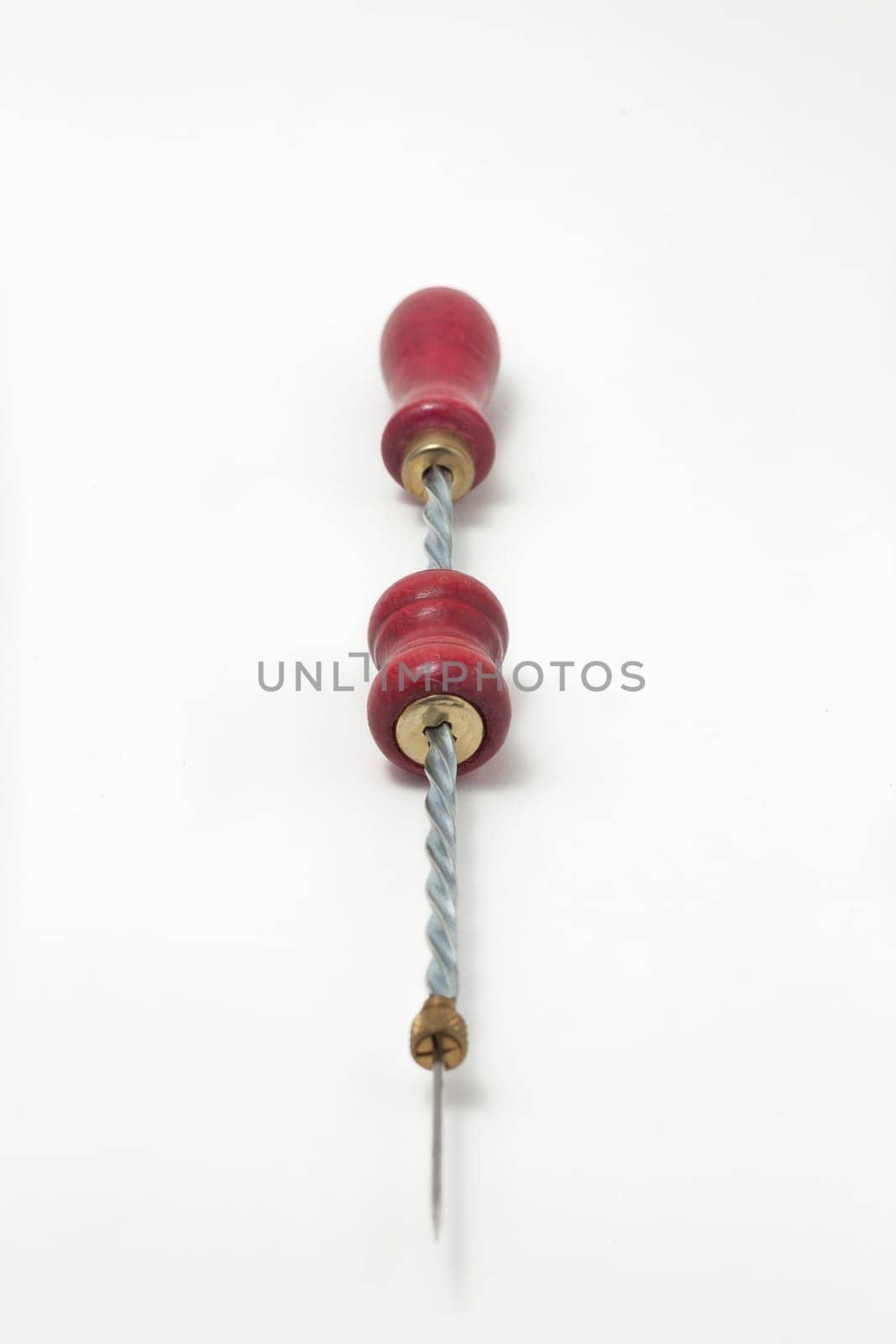 Hand drill with wood handle red isolated on white background