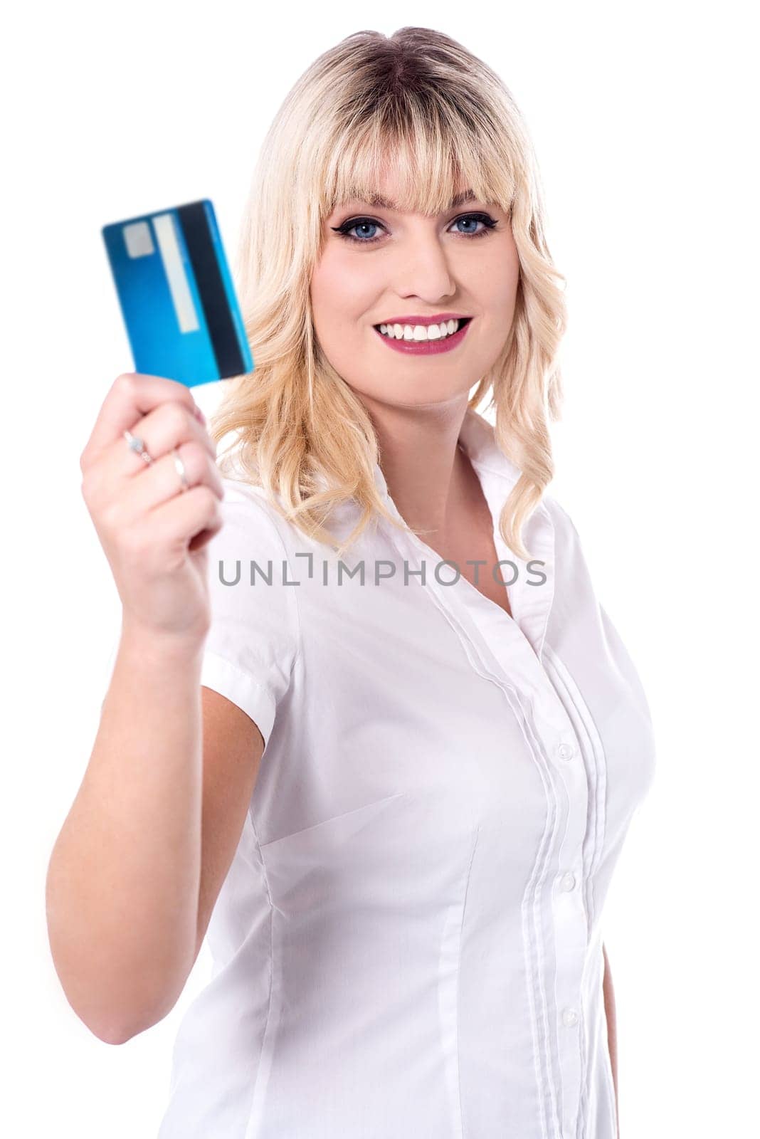 Cheerful shopaholic lady holding debit card