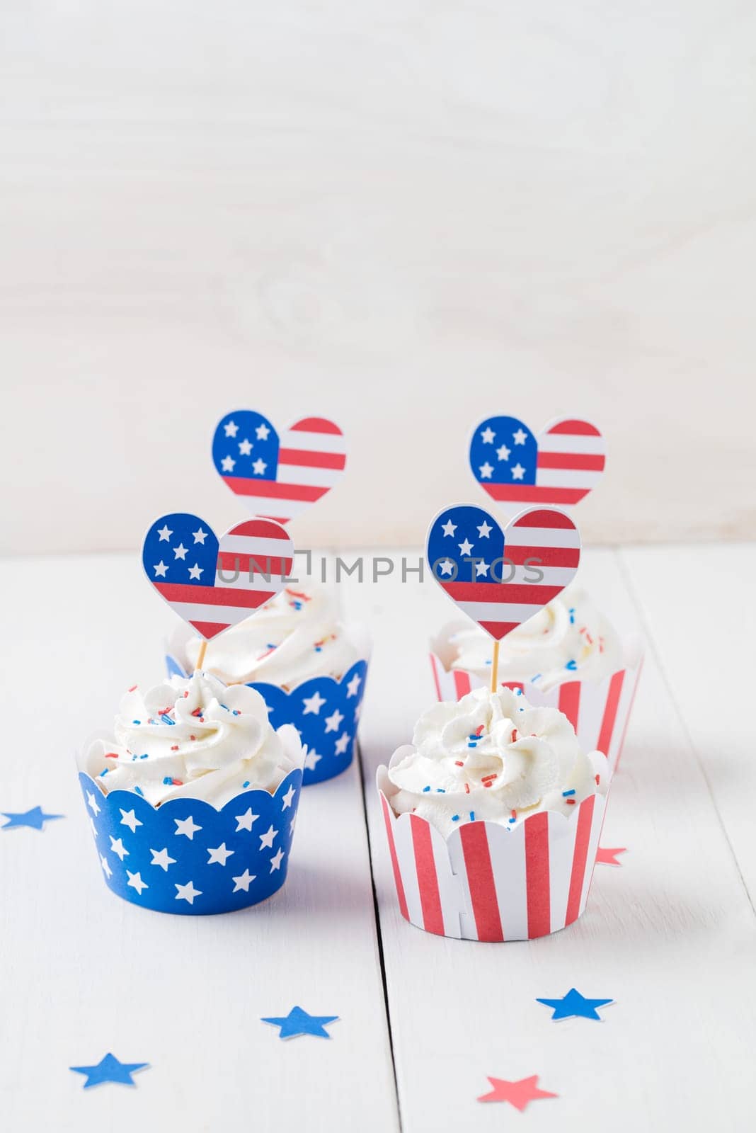 Decorated cupcakes on white table to celebrate July 4th