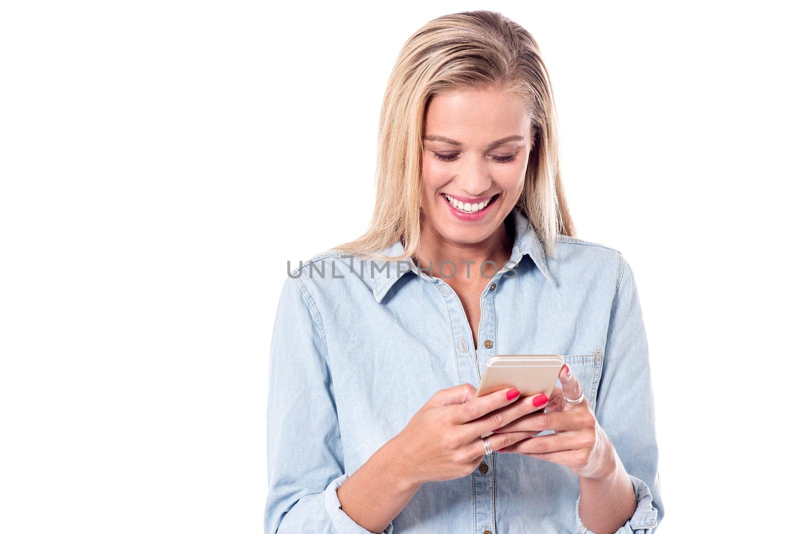 Delightful woman sending message to her friends