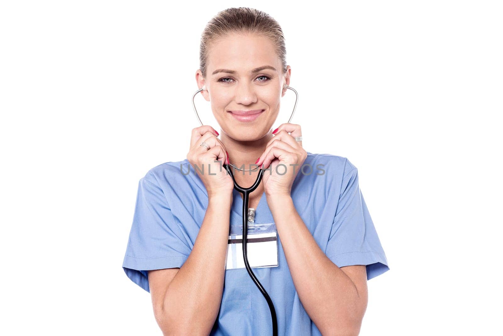Smiling doctor using stethoscope