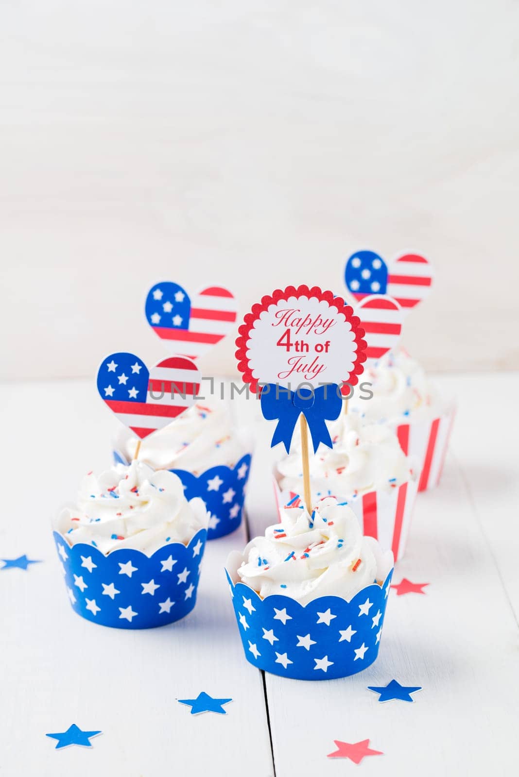 Decorated cupcakes on white table to celebrate July 4th