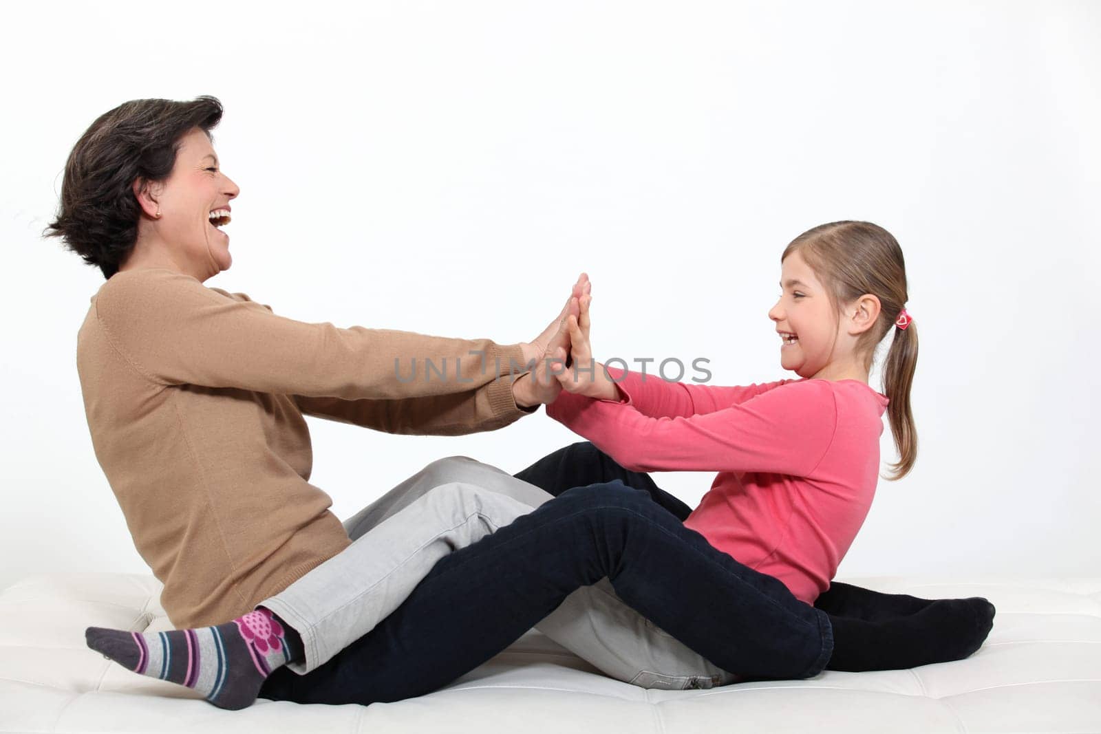 Mother playing with daughter