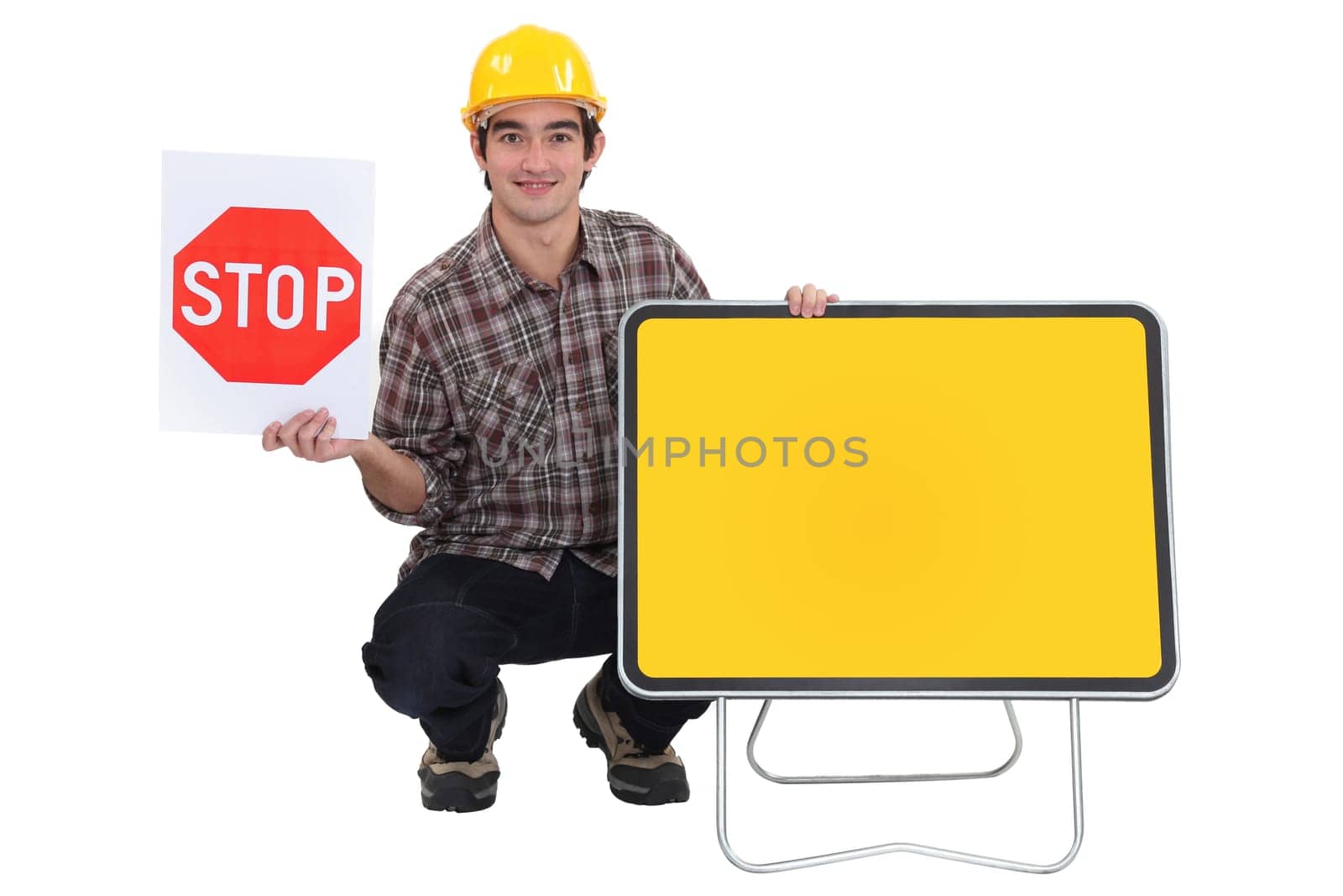 Worker with a road sign