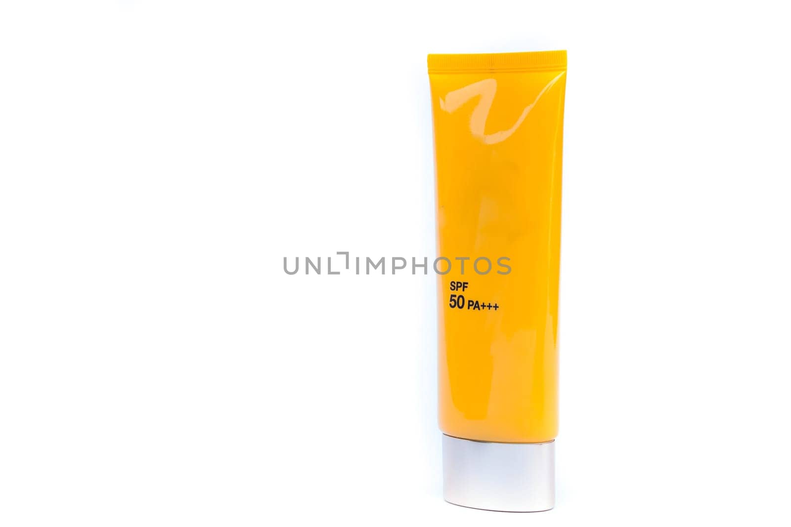 Tube container of sun cream on white background
