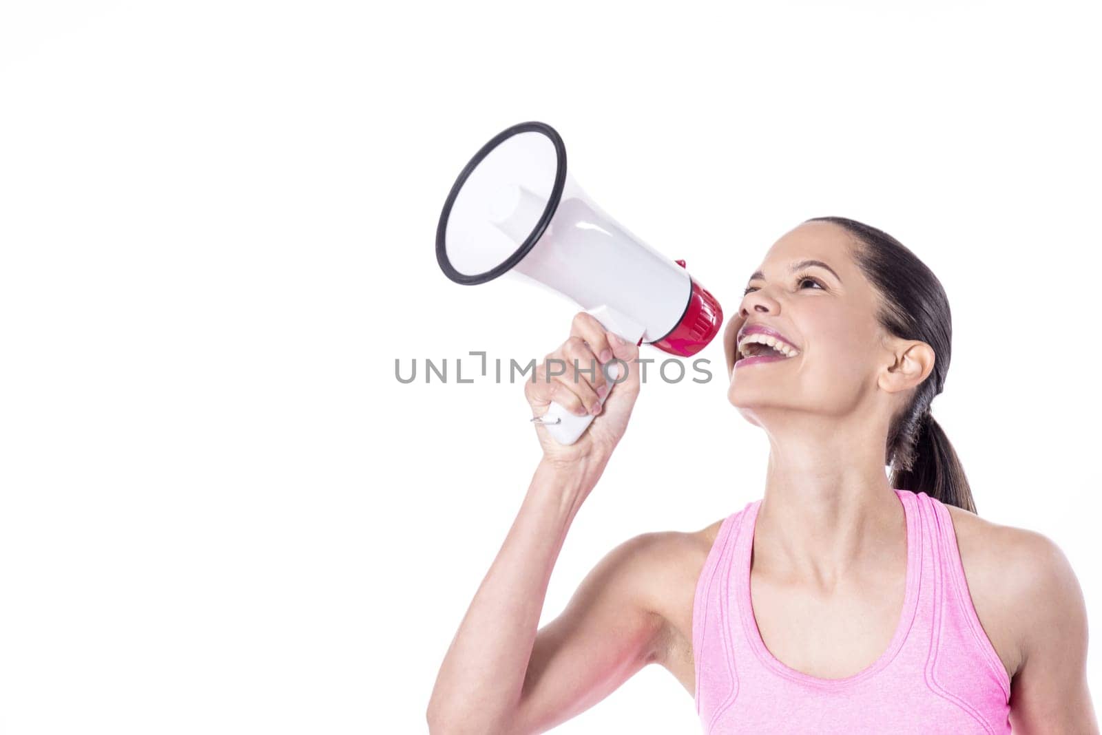 Happy woman holding loudhailer