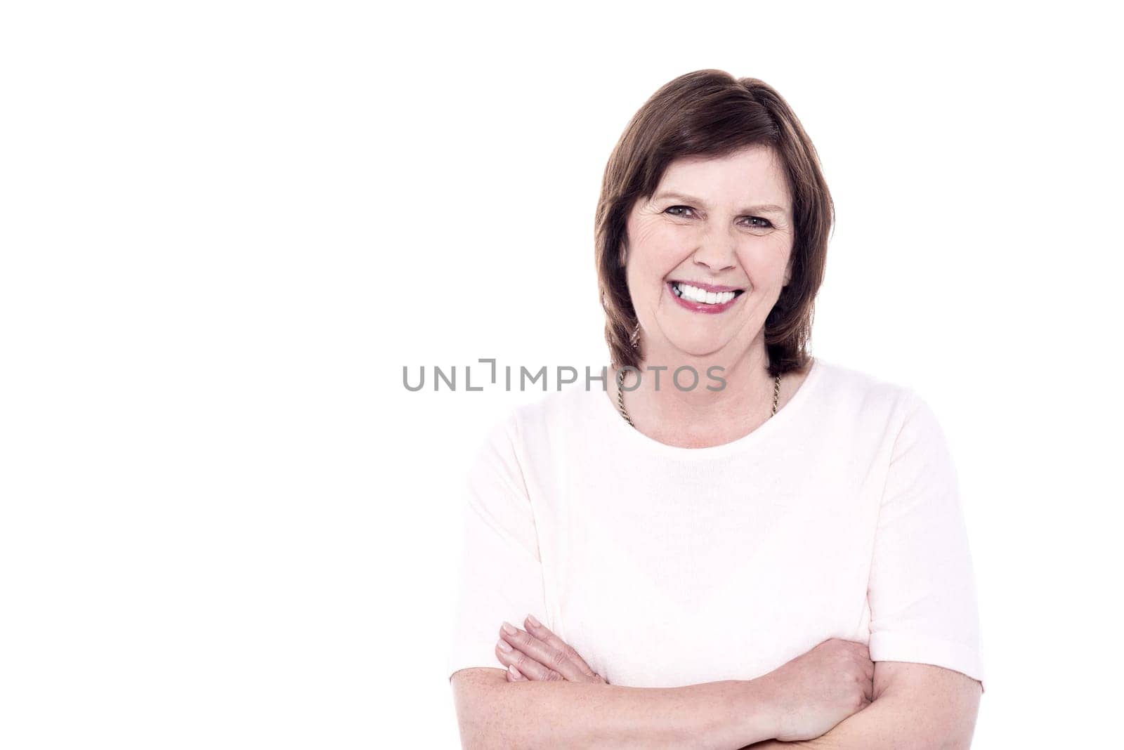 Picture of confident senior woman with arms folded