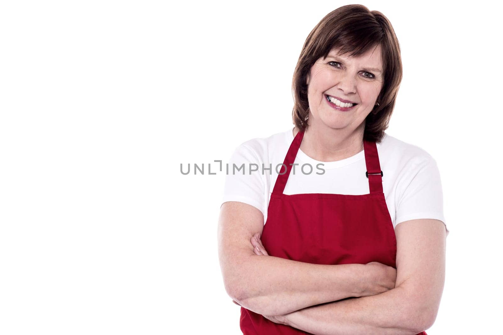 Pretty baker woman posing with confidence arms folded
