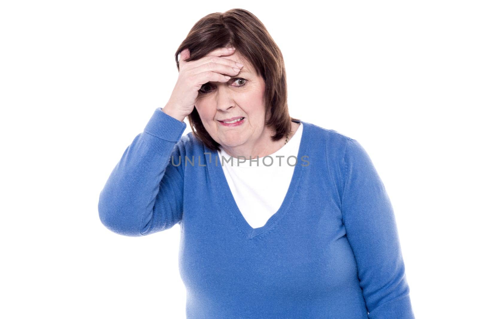 Confused woman puts her hands on the head