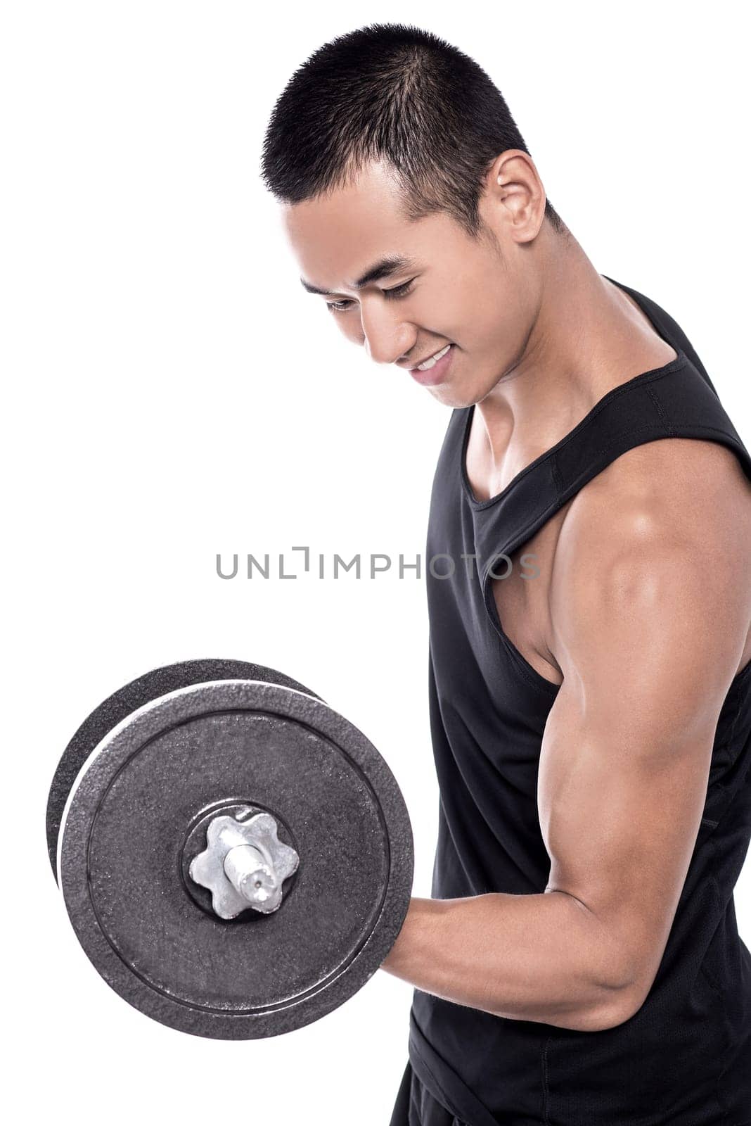 Picture of a muscular young man lifting weights