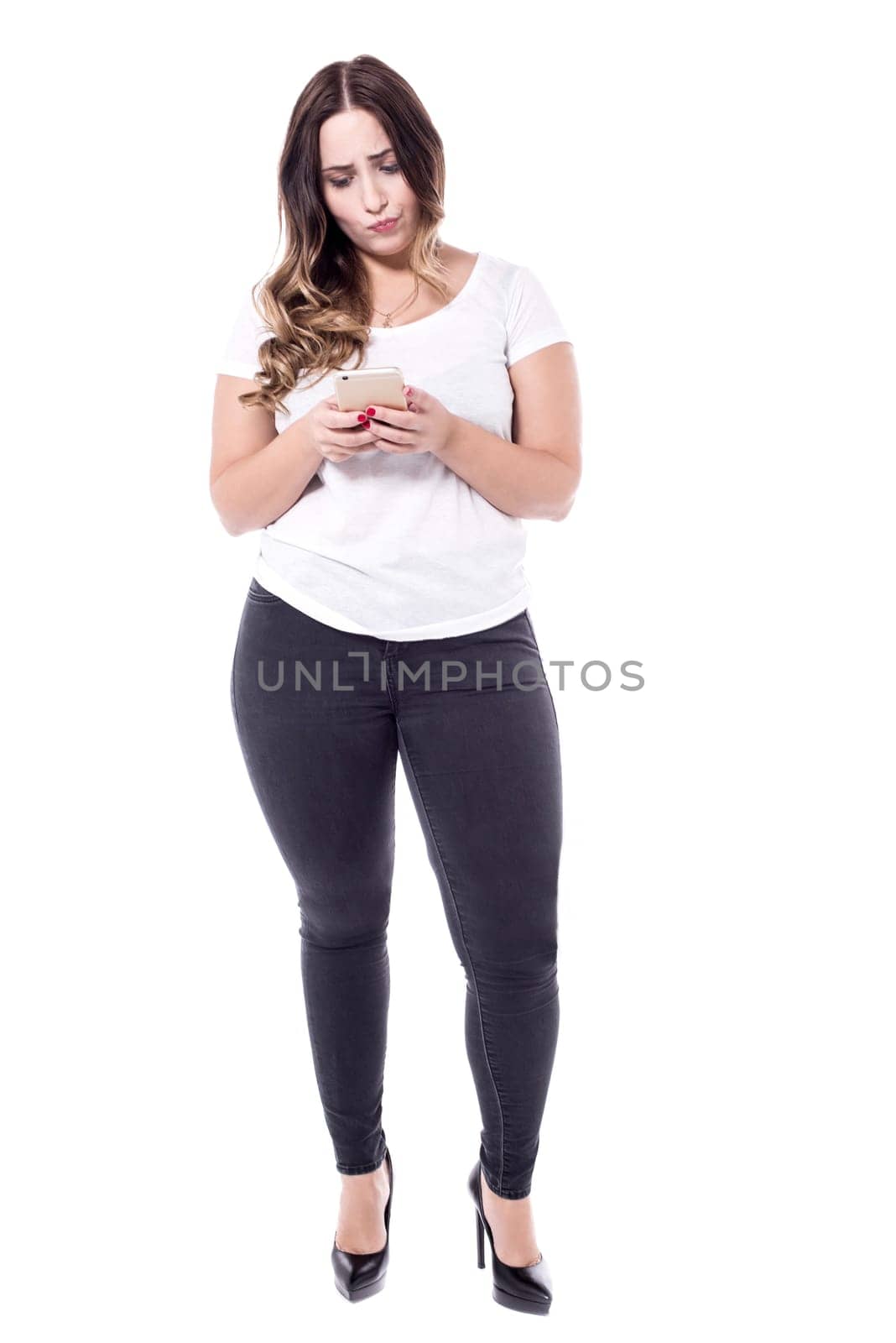 Pretty young woman using her cell phone