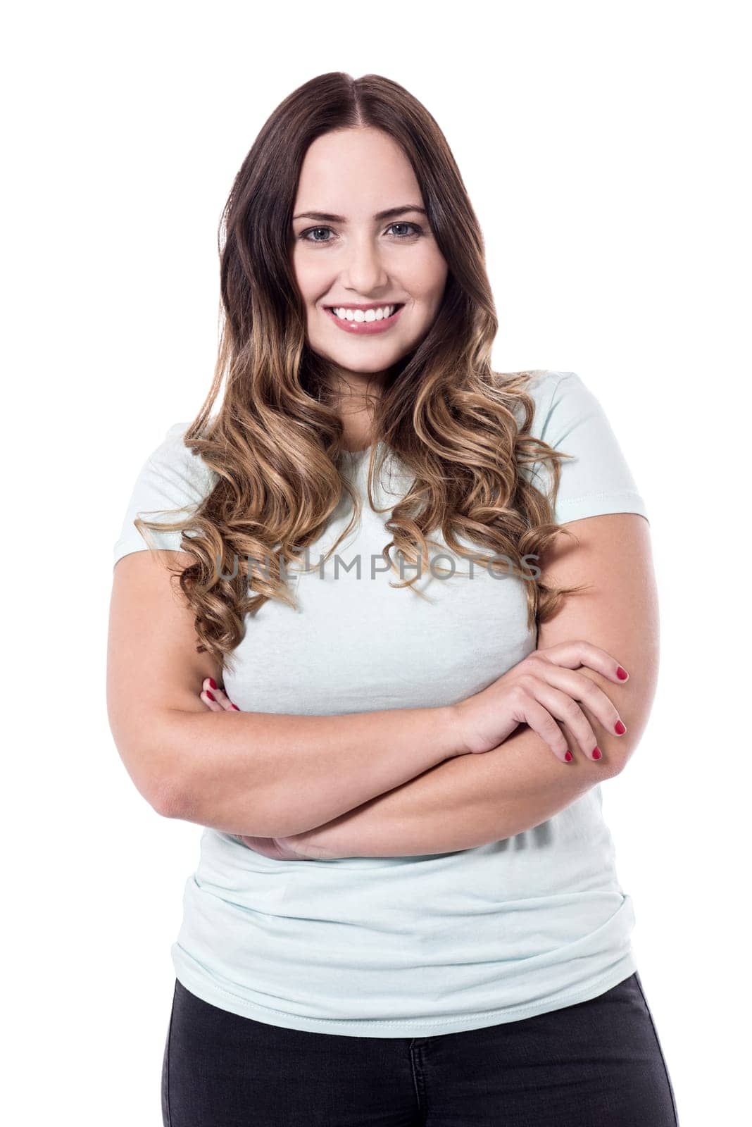 Beautiful and attractive woman with arms folded.