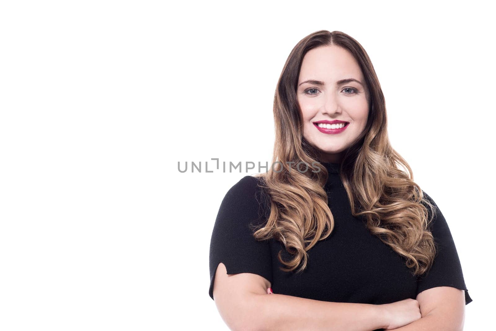 Image of beautiful smiling lady with crossed hands