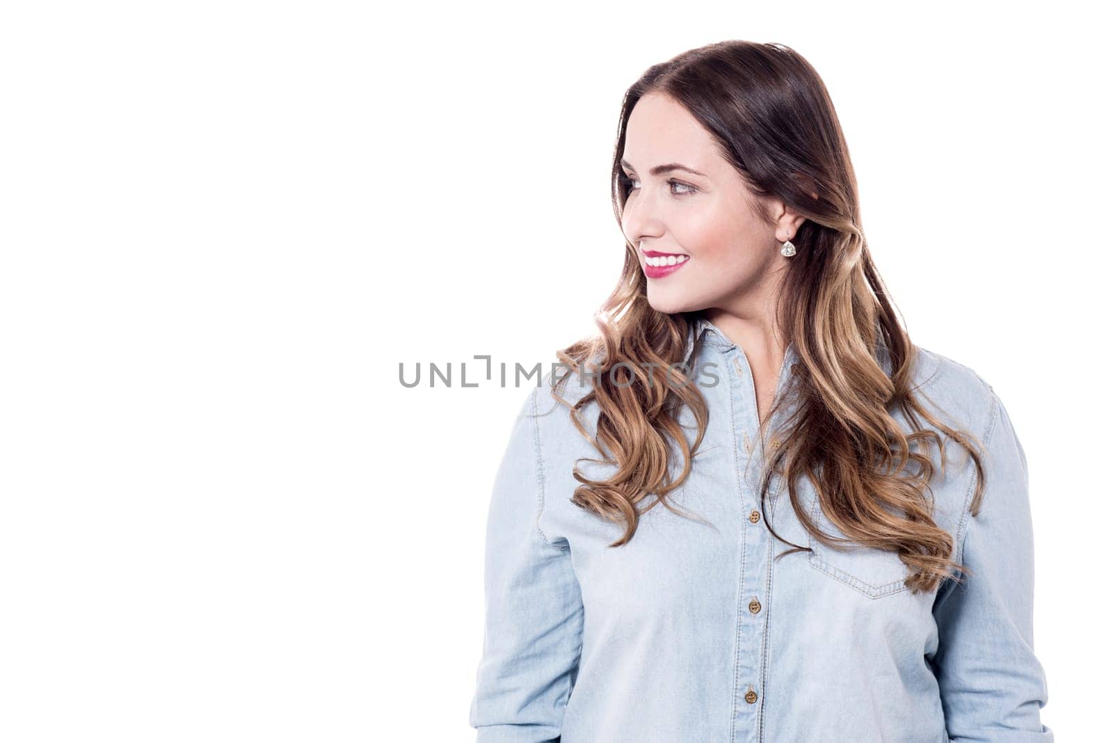 Smiling young woman looking at copy space