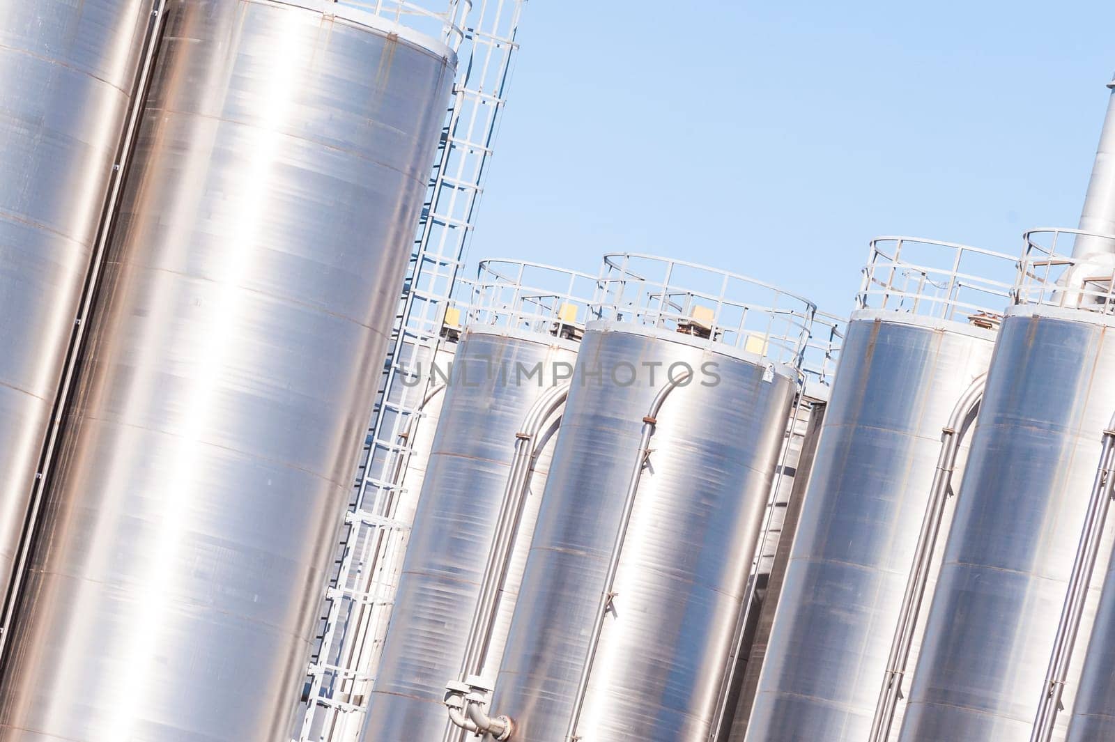 Detail of chemical plant, silos and pipes