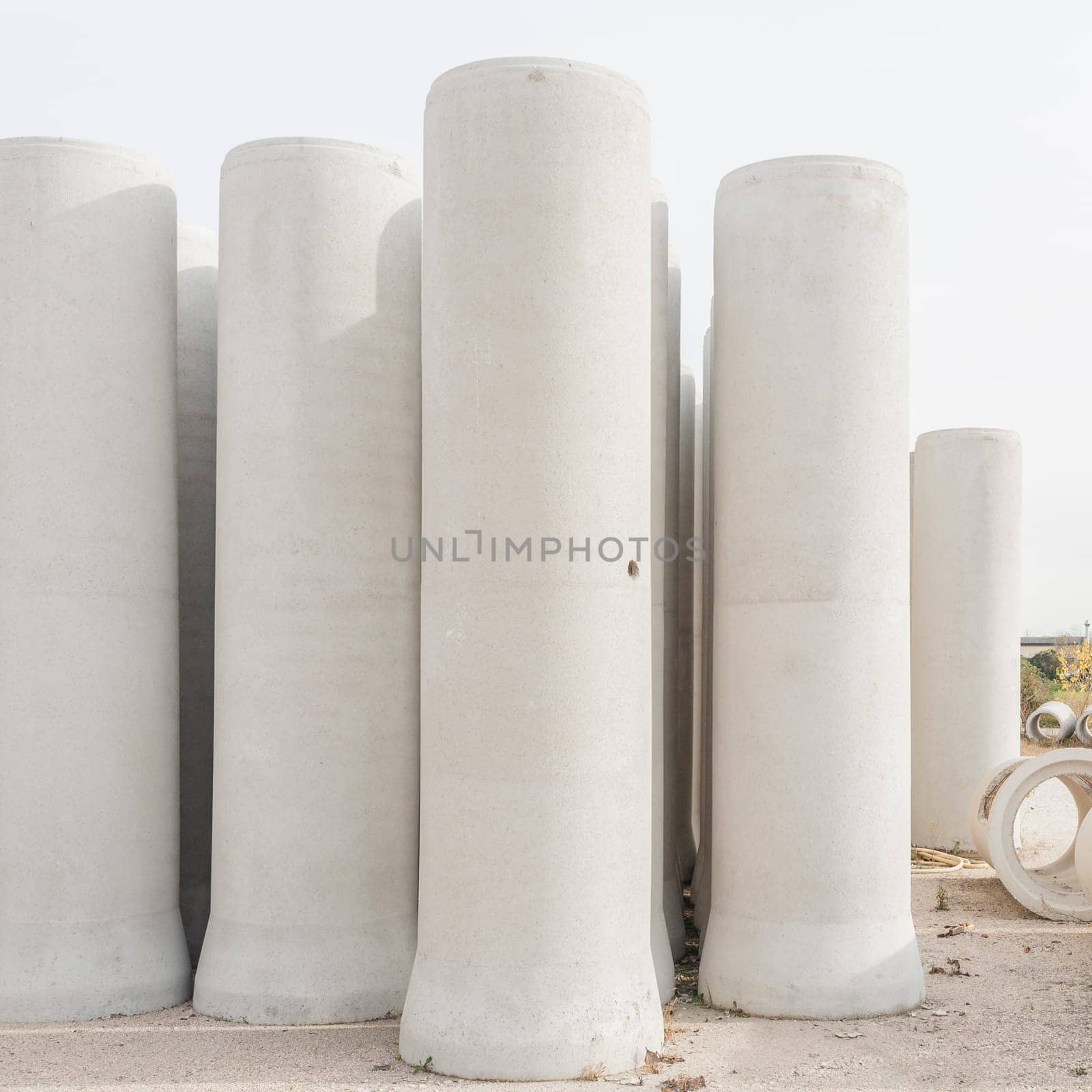 Concrete drainage pipes for industrial building construction.