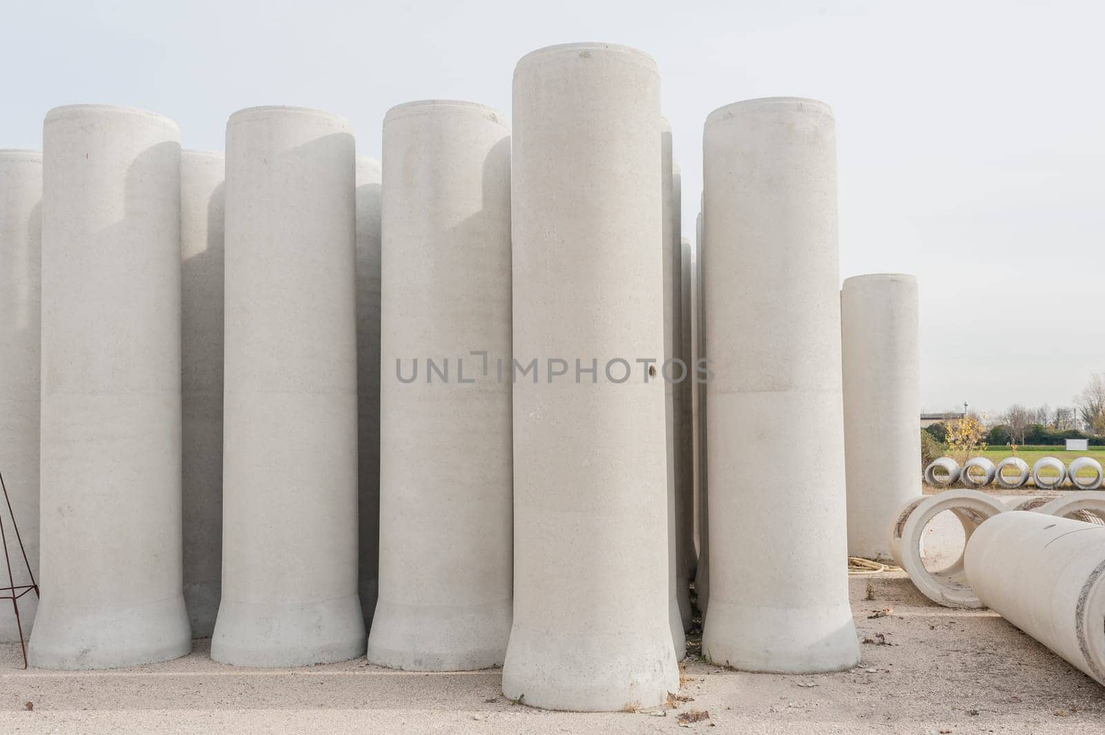 Concrete drainage pipes for industrial building construction.