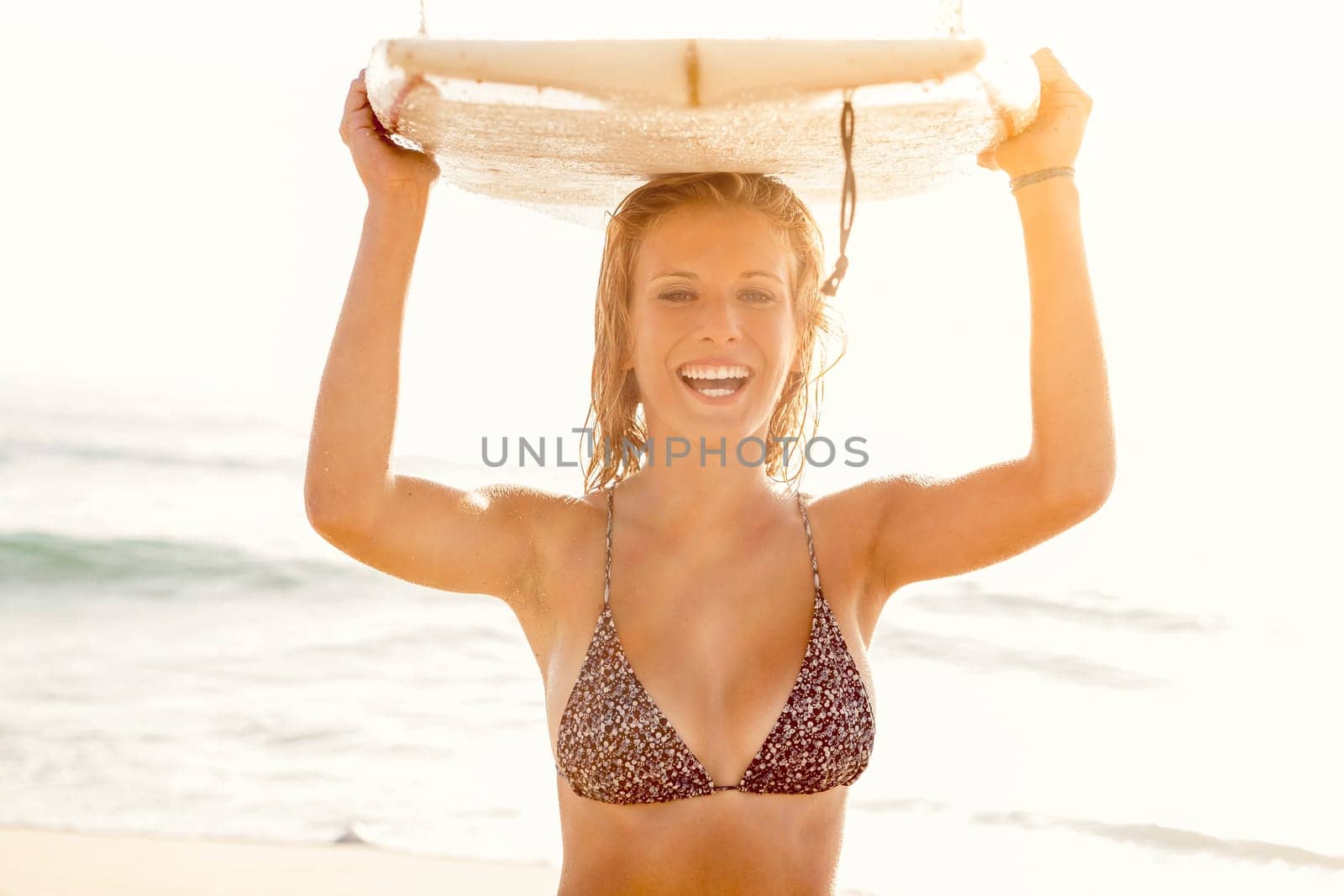 Beautiful and sexy woman at the beach enjoying the day