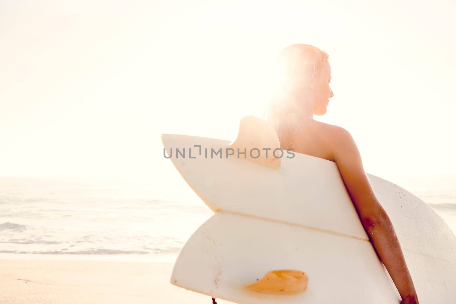 Beautiful and sexy woman at the beach enjoying the day