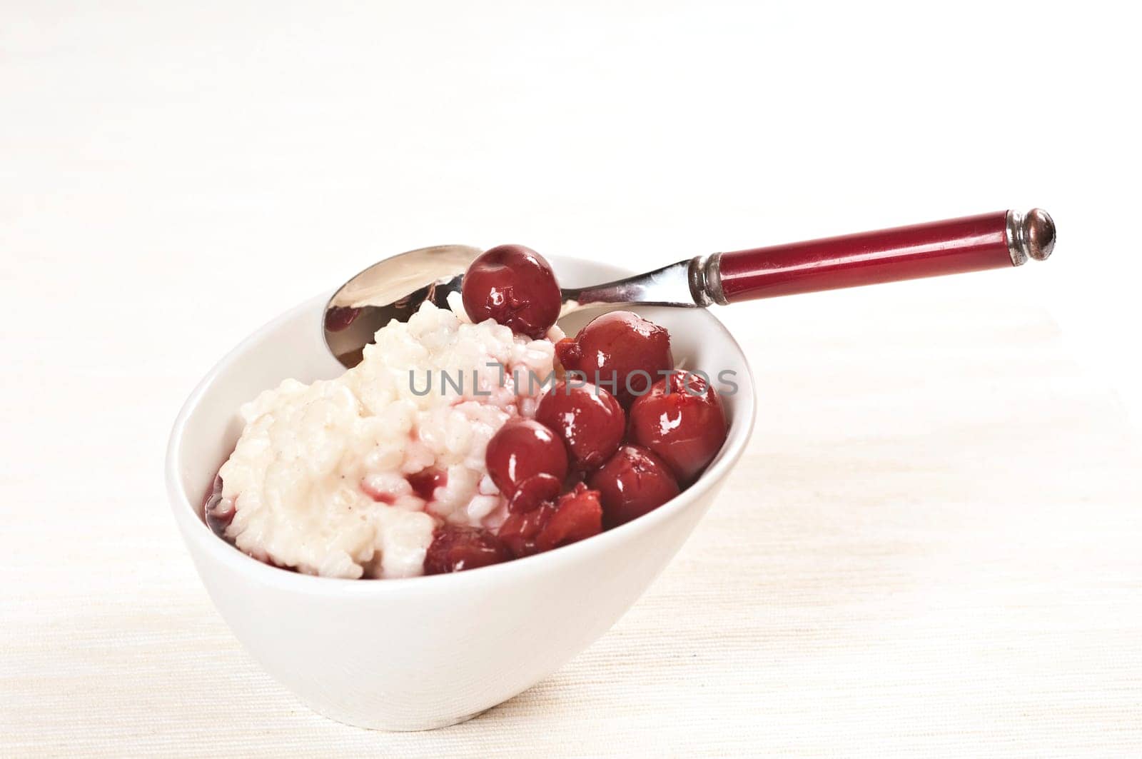 Milk rice with cherries