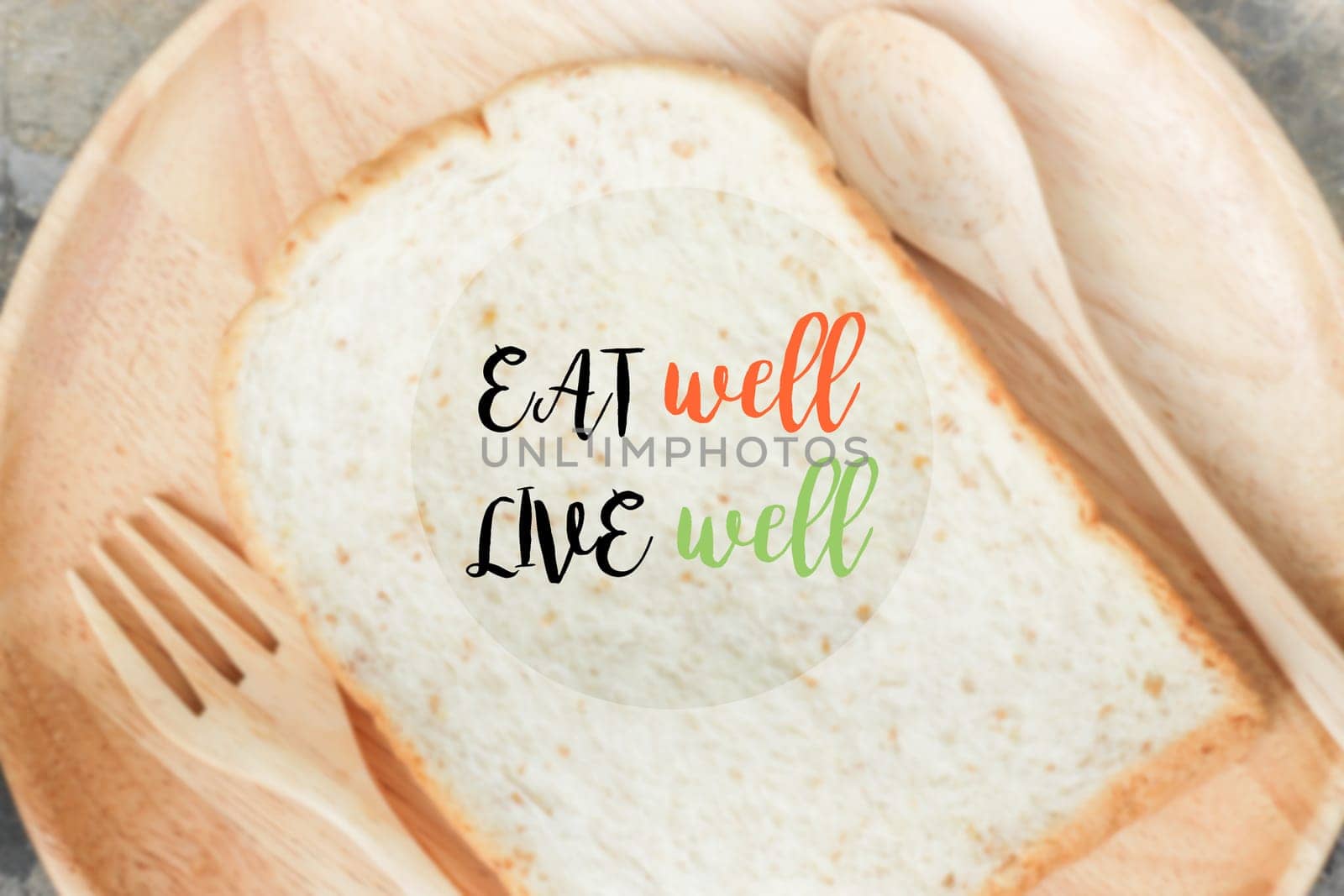 Sliced of whole wheat bread with healthy quote, stock photo