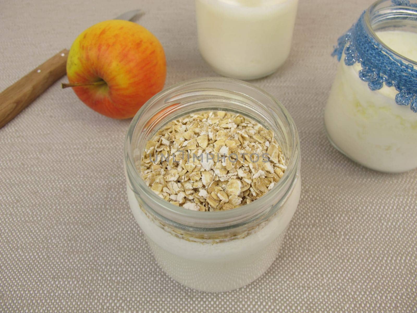 Yoghurt in the glass from the yoghurt maker with oatmeal