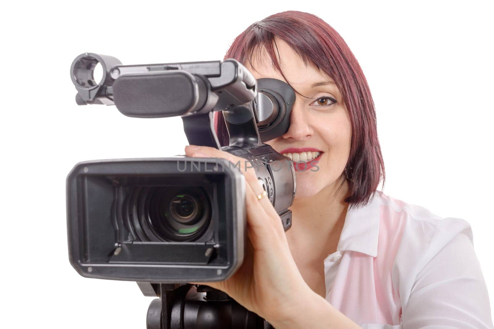 a pretty camerawoman with a professional camera, on white