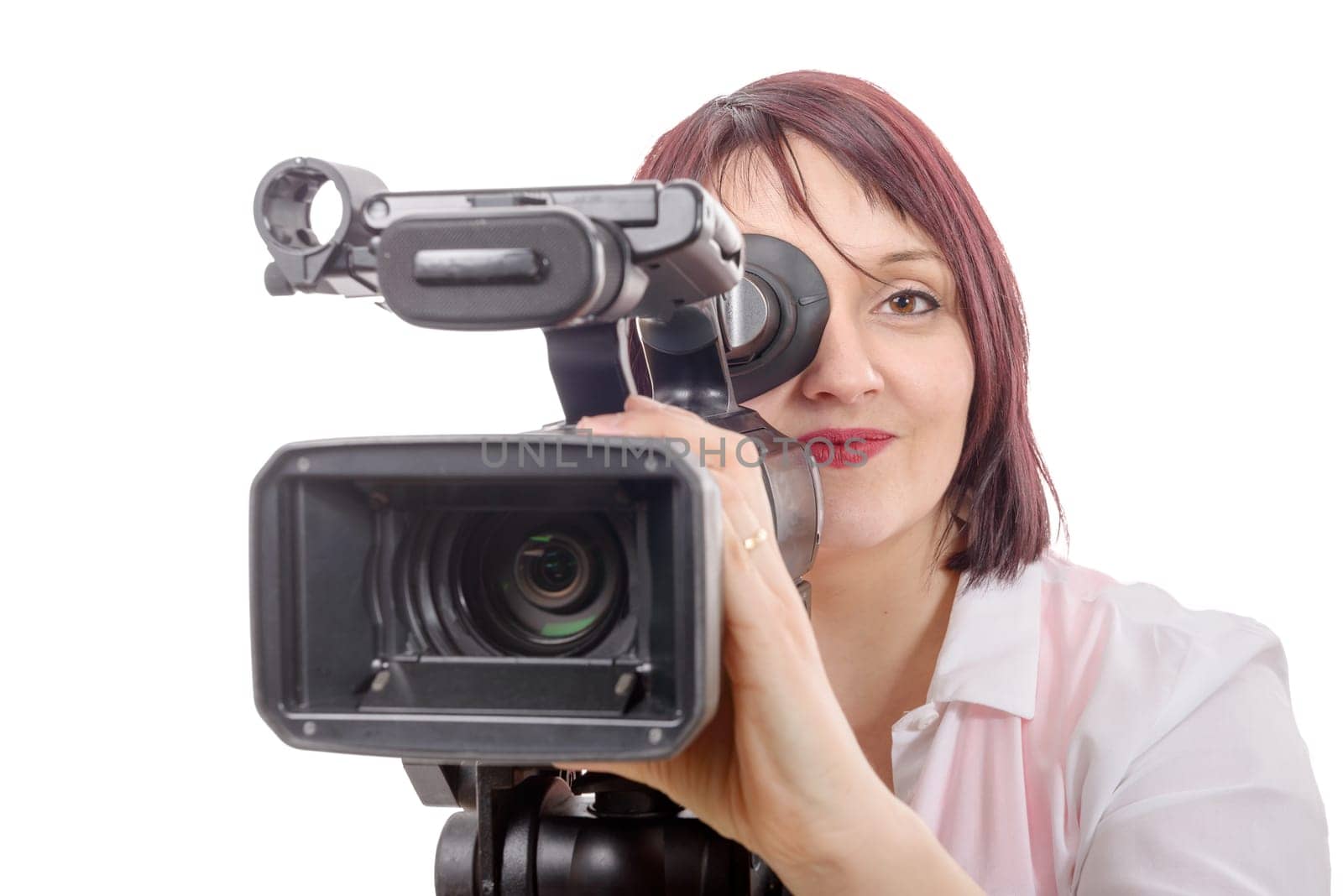 a pretty camerawoman with a professional camera, on white