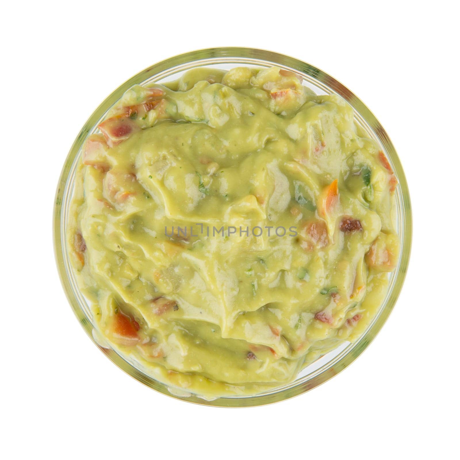 Bowl of fresh guacamole isolated on white and viewed from directly above