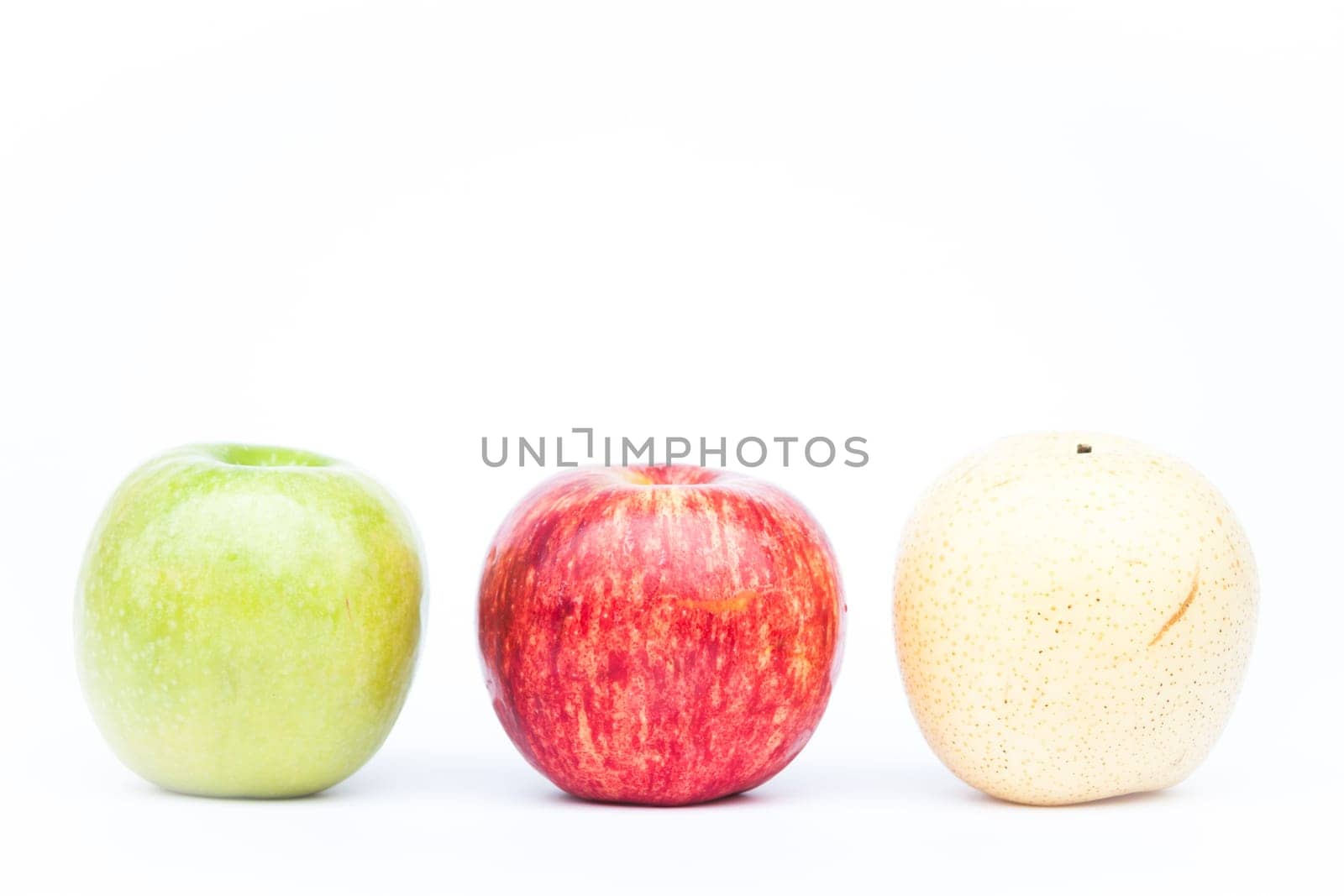Three different kind of apples on white background, stock photo