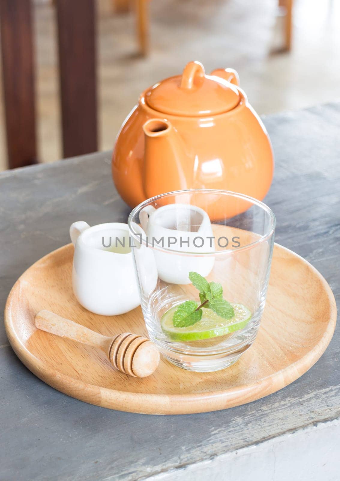 Hot pot of honey lime healthy drink, stock photo