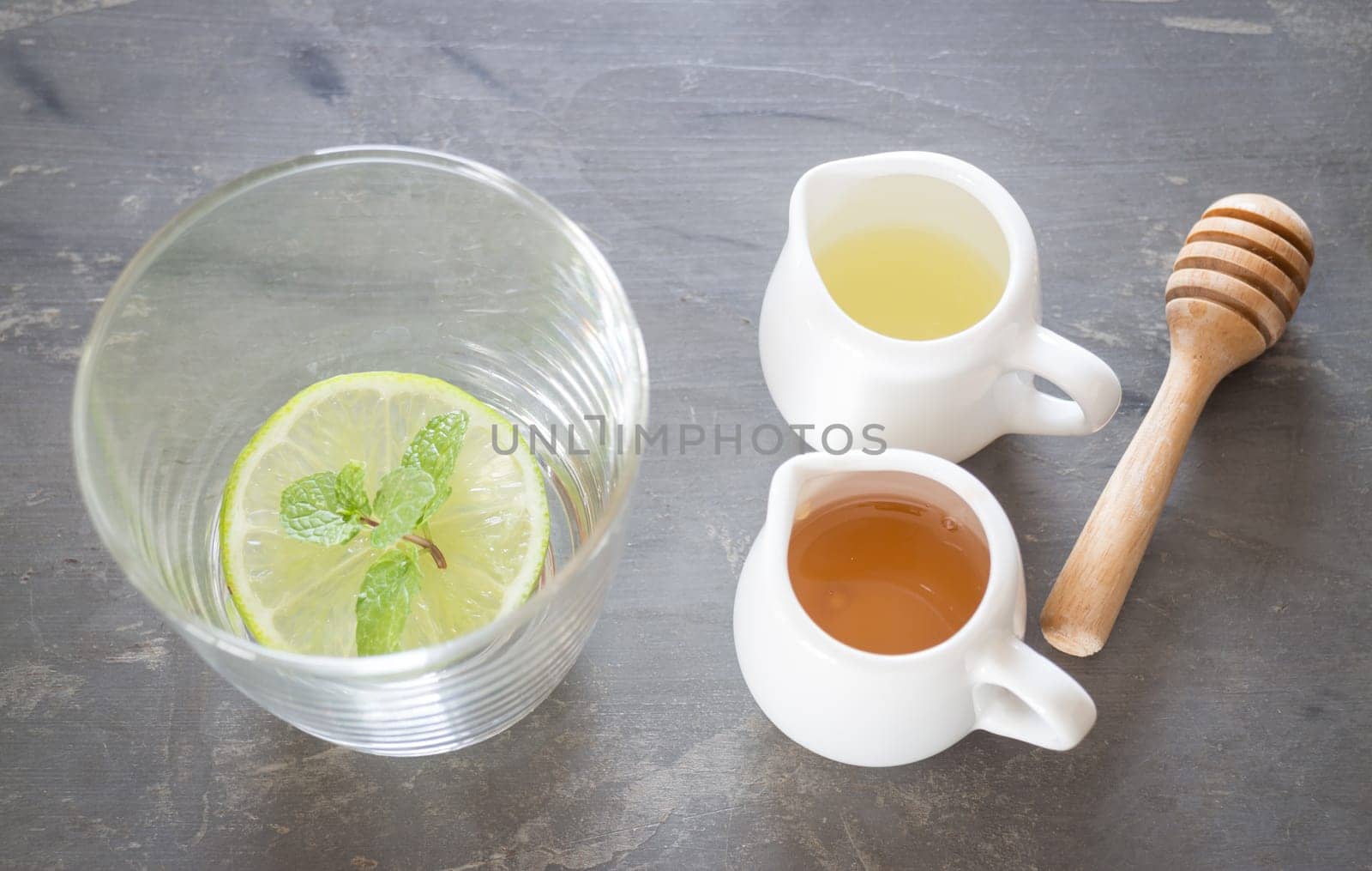 Cup of honey lime healthy drink, stock photo