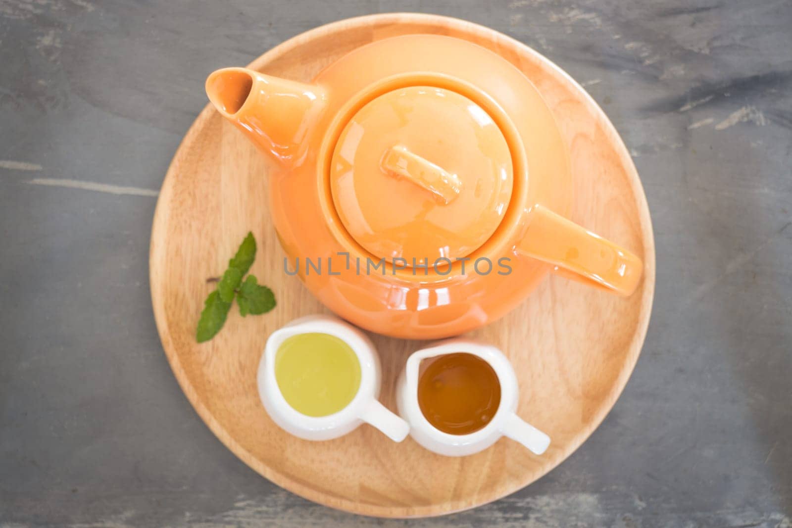 Hot pot of honey lime healthy drink, stock photo