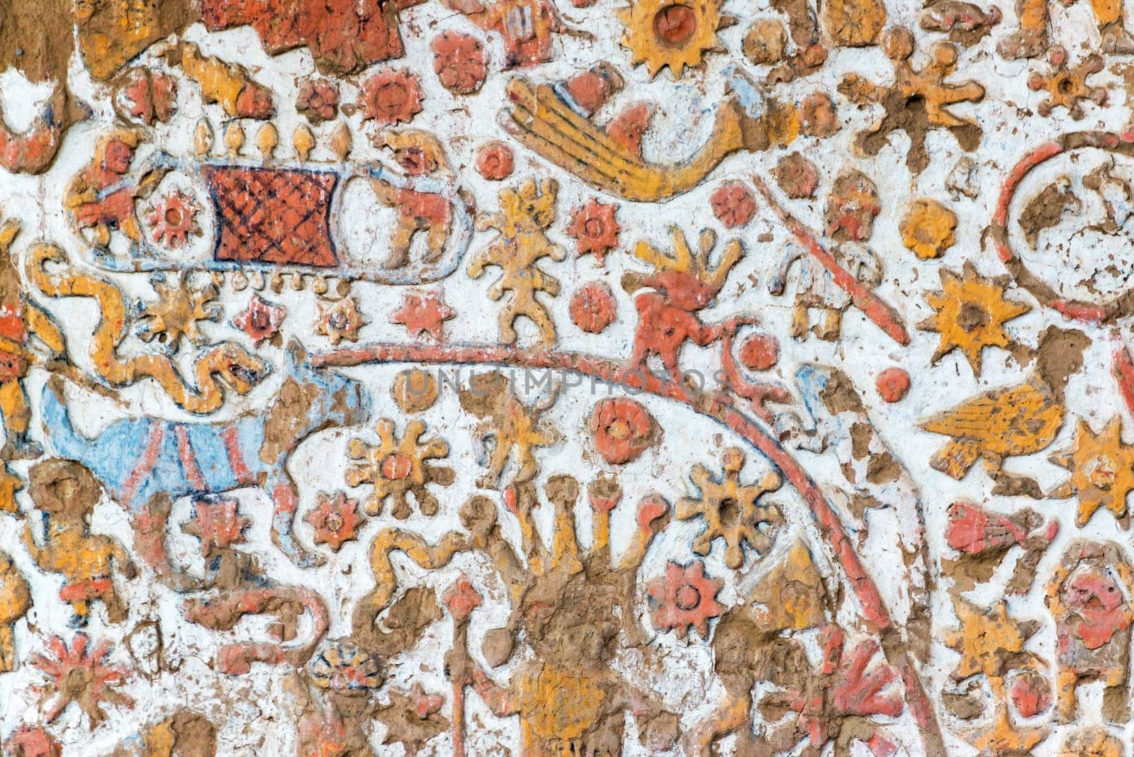 Details of a colorful ancient mural in the Huaca de la Luna in Trujillo, Peru