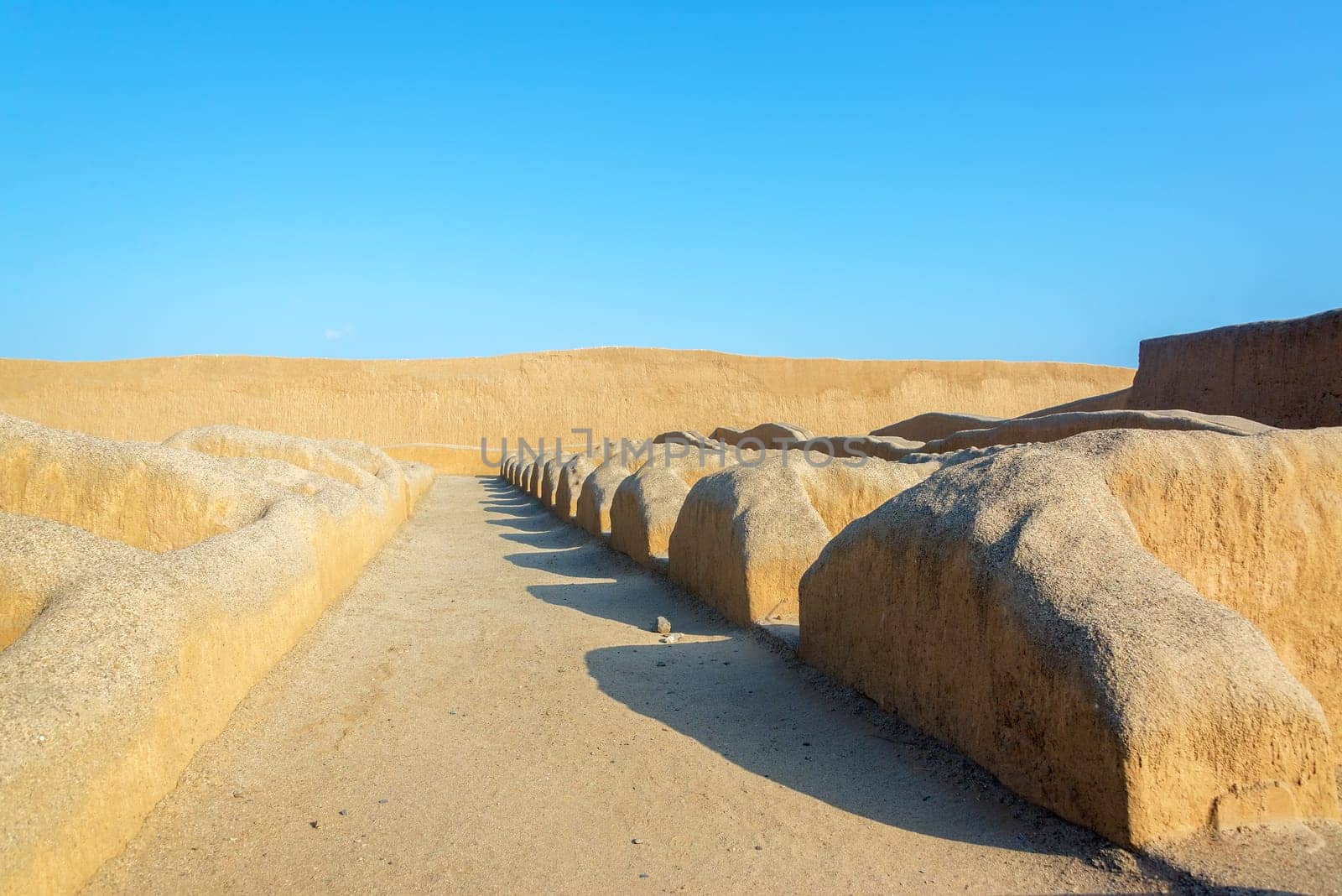 Ancient adobe walls of the Chimu city of Chan Chan in Trujillo, Peru