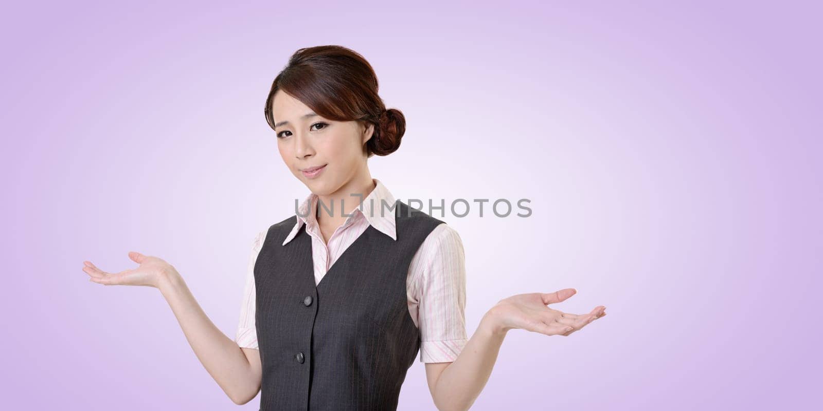 Helpless young business woman shrugs her shoulders. closeup portrait with clipping path.