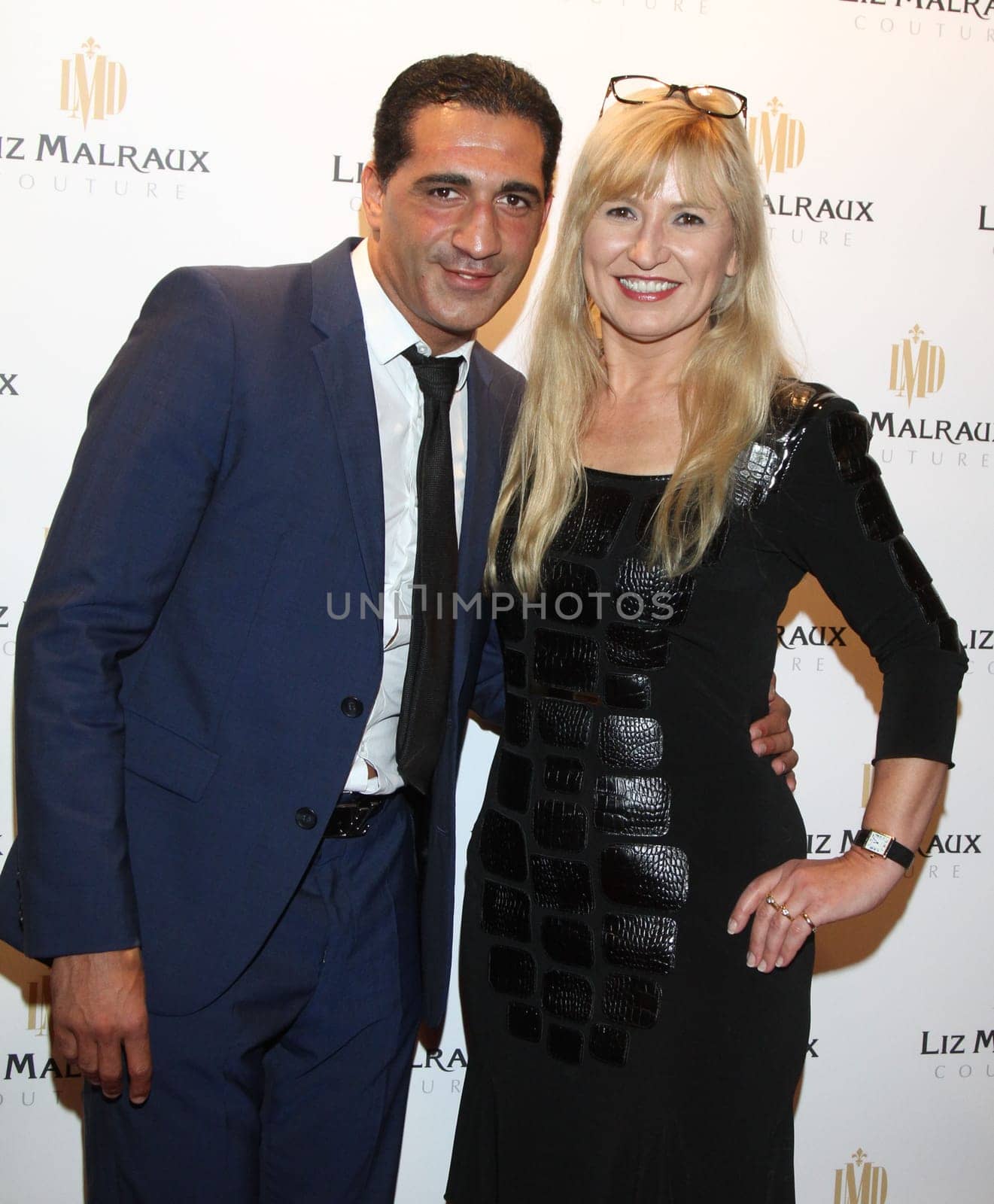 Ismail Oezen and Liz Malraux at Liz Malraux's fashion show in Hamburg