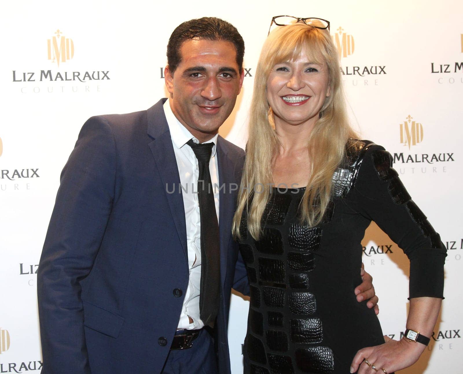 Ismail Oezen and Liz Malraux at Liz Malraux's fashion show in Hamburg