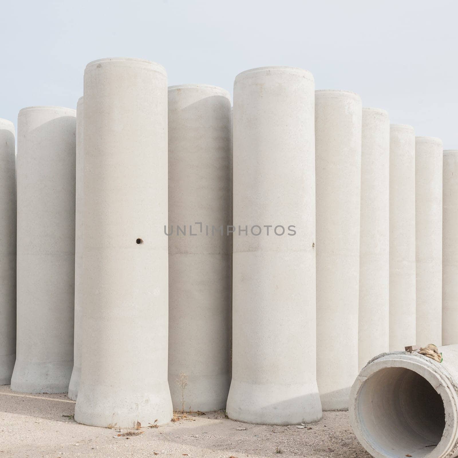 Concrete drainage pipes for industrial building construction.