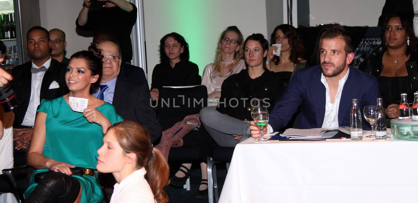 Rafael van der Vaart and Sabia Boulahrouz flirting at an event