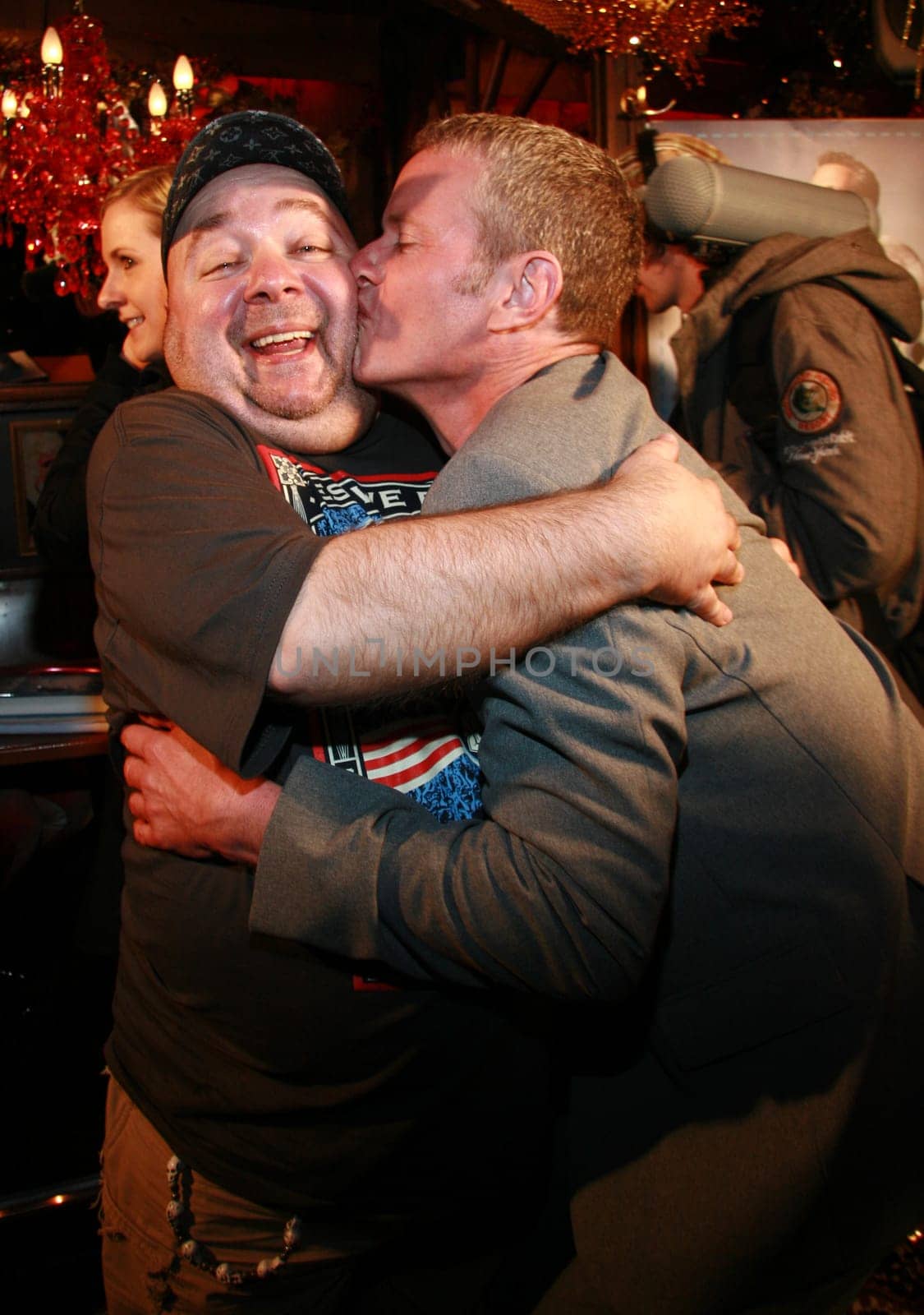 Invitation to the press event: PETA Vice President Dan Mathews,Dirk Bach,/ Presentation of the new book "RESPEKT!"" Photo: PETA Vice President Dan Mathews cuddles Dirk Bach"