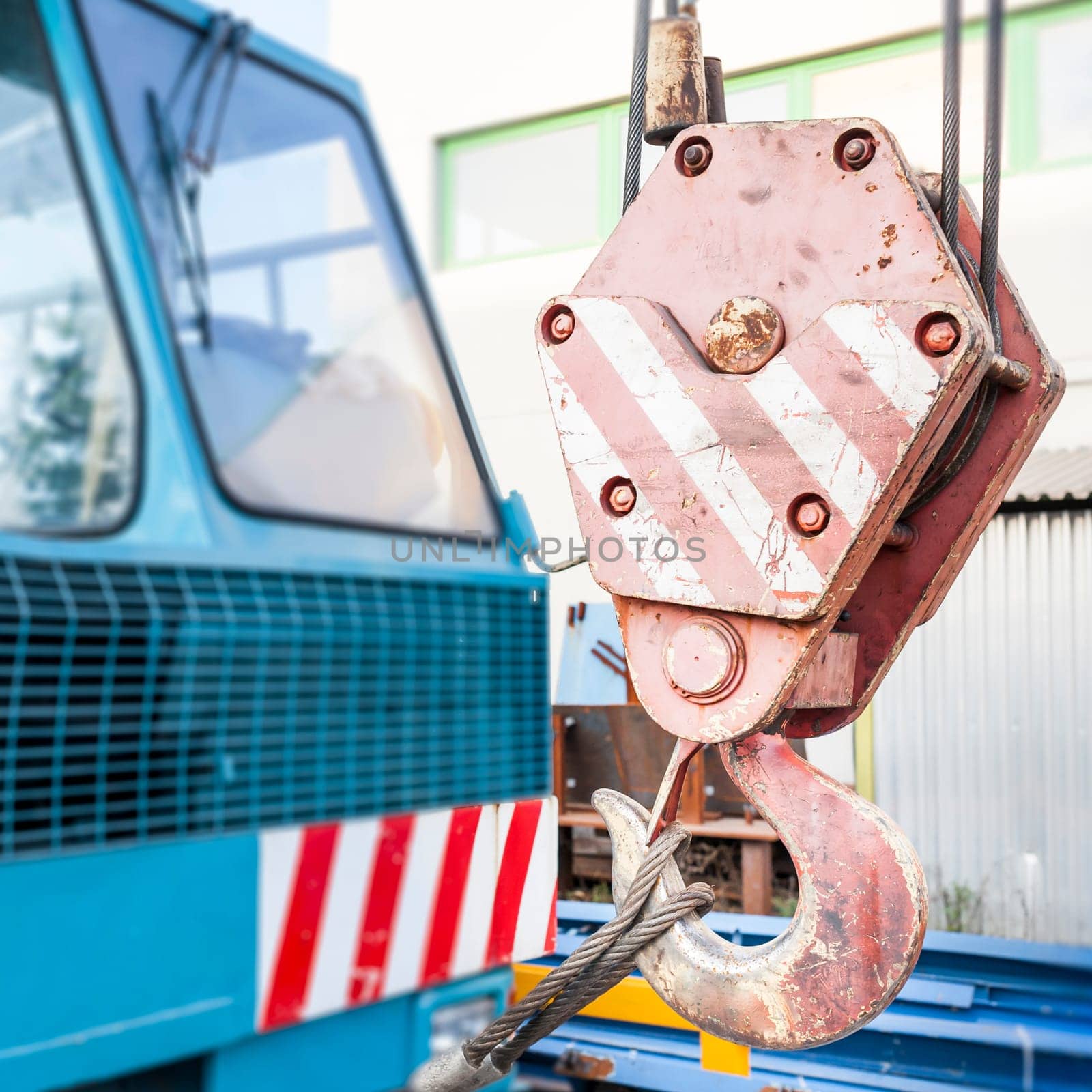 A close up of the hook on a crane.
