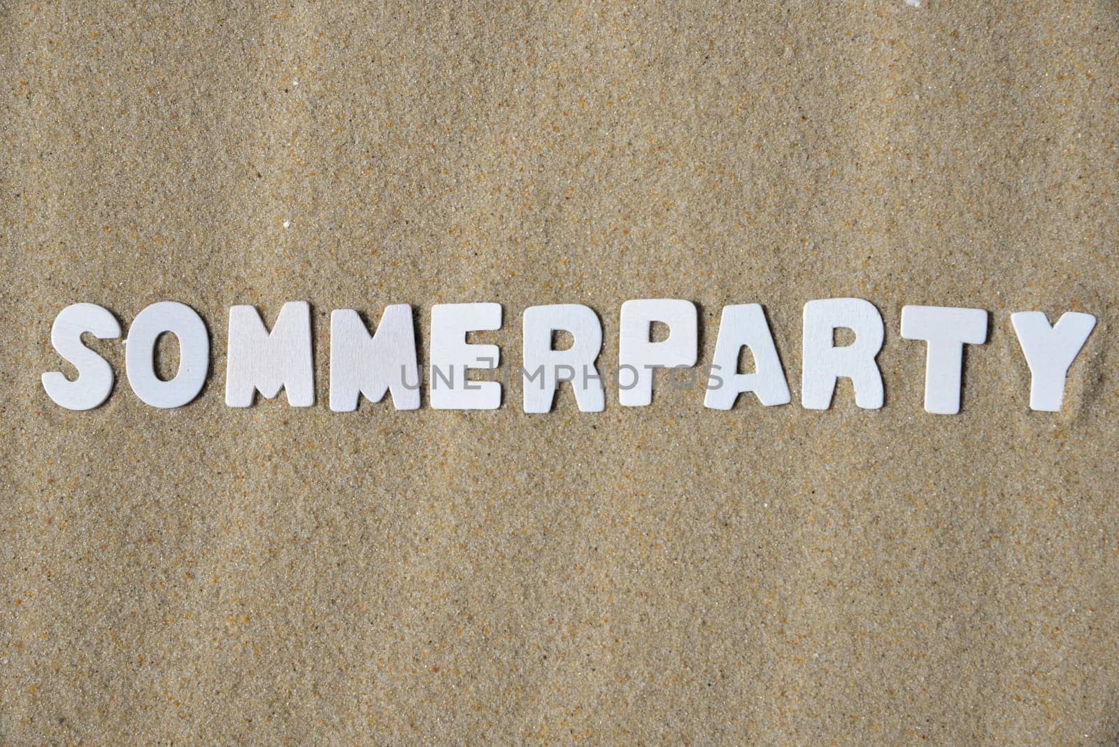 Summer party party word letters sand beach