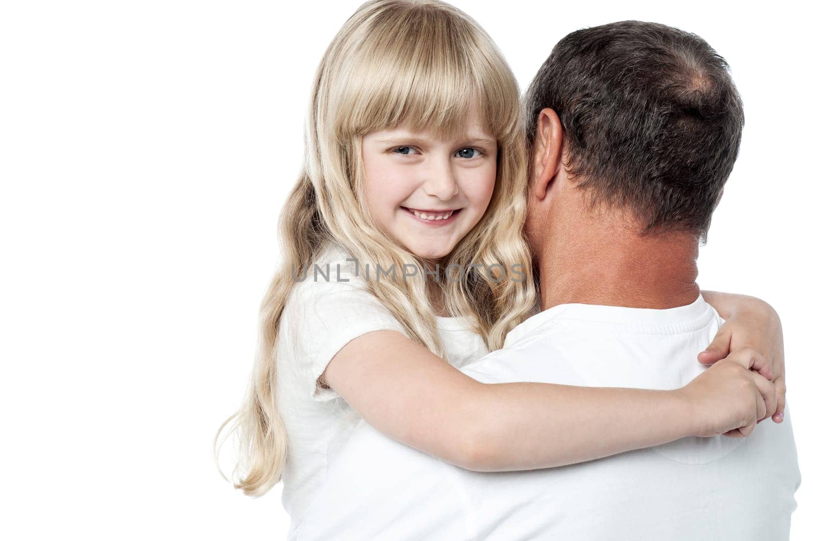 Happy little girl resting on her father's shoulder.