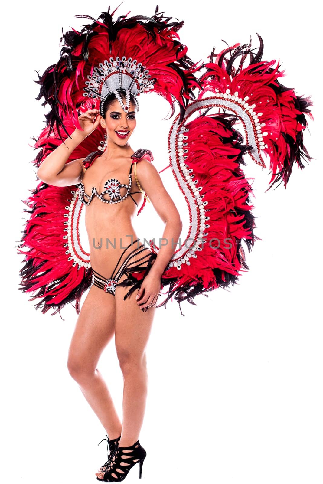 Young woman in carnival costume with hands on hip - Isolated