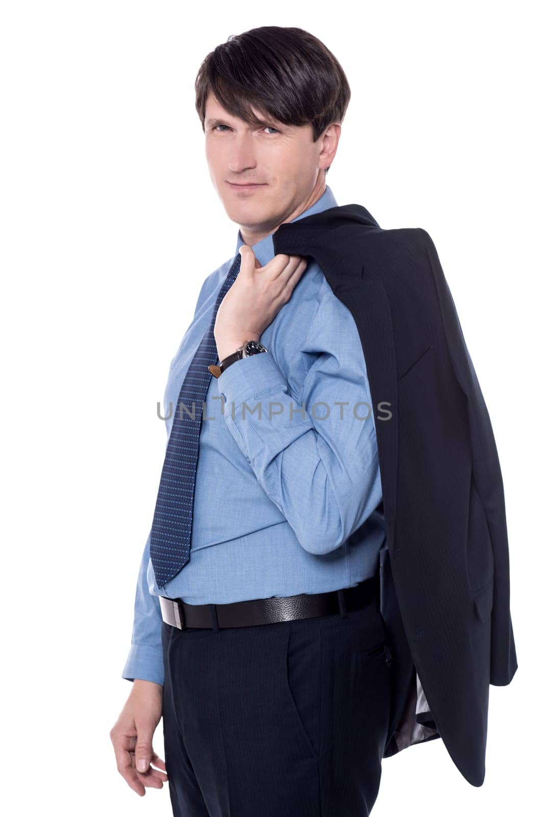 Businessman holding his coat over his shoulder.