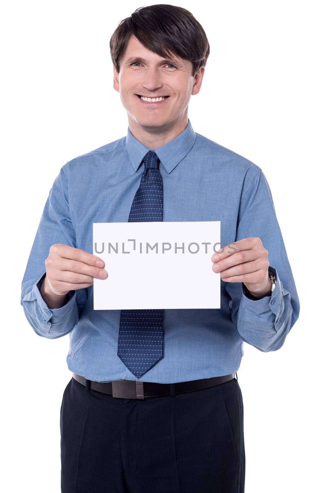 Handsome man holding blank white billboard. Showing to camera