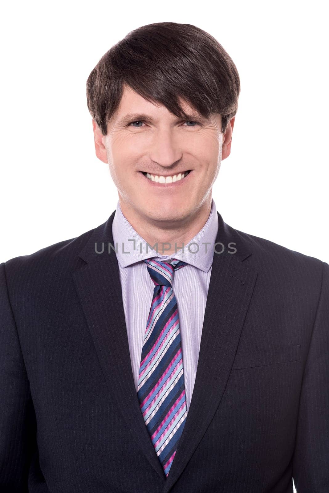 Picture of handsome businessman posing to the camera.
